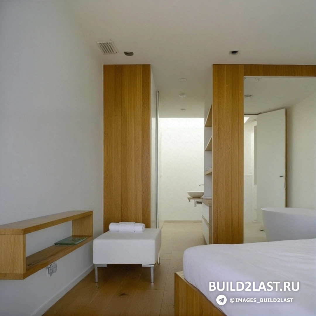 Современная спальня в вилле в Сен-Тропе с кроватью и ванной, панорамным остеклением и светлыми отделками.